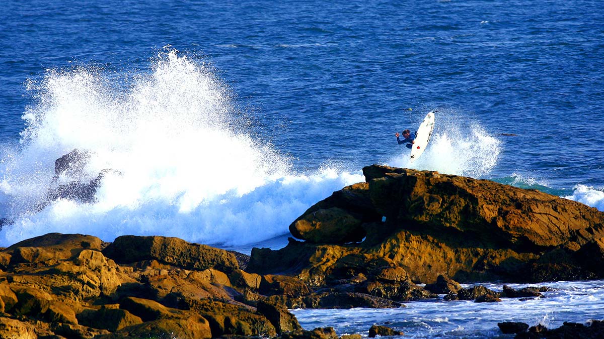 This shot of Brad Ettinger will always be one of my favorites. He\'s such a funny guy and we worked together for about 5 years straight training and shooting. I remember pushing him on a swing at a park so he could get the concept of \"the weightless tail\" instead of always just carving the rail into the lip. Anyway, we would shoot this place alot from different angles and finally came up with this one. Photo: <a href=\"https://aladdinsurfmag.net/\"> Foster </a>