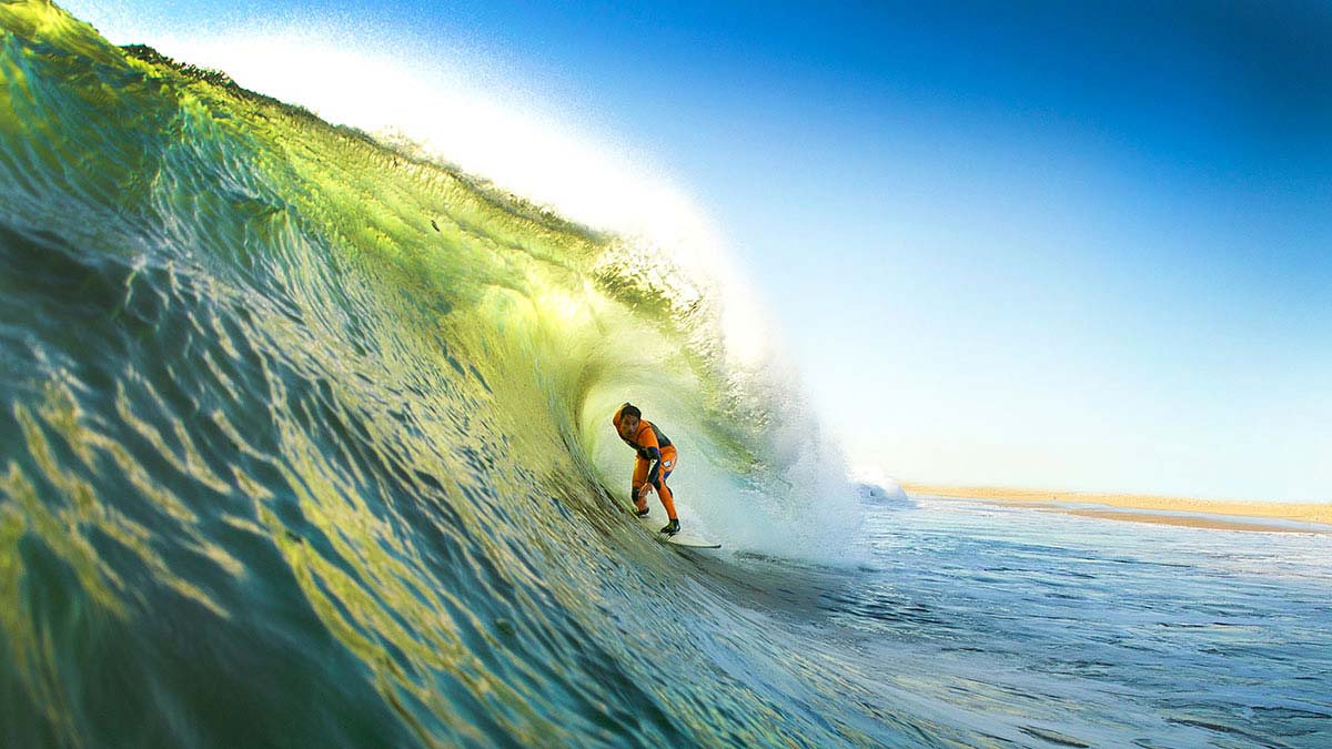 This is my boy Chris Waring. This day was crazy. We got up super early and shot water in Oxnard. It was my first time shooting water there and I actually had a panic attack on the way there and we had to pull over. This is the end of that day where we shot a little beach break on our way home and I just love the lighting. Photo: <a href=\"https://aladdinsurfmag.net/\"> Foster </a>