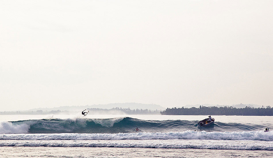 Chippa Wilson. Pulled back punt. Photo: <a href=\"https://johnbarton.net.au/\">John Barton</a>