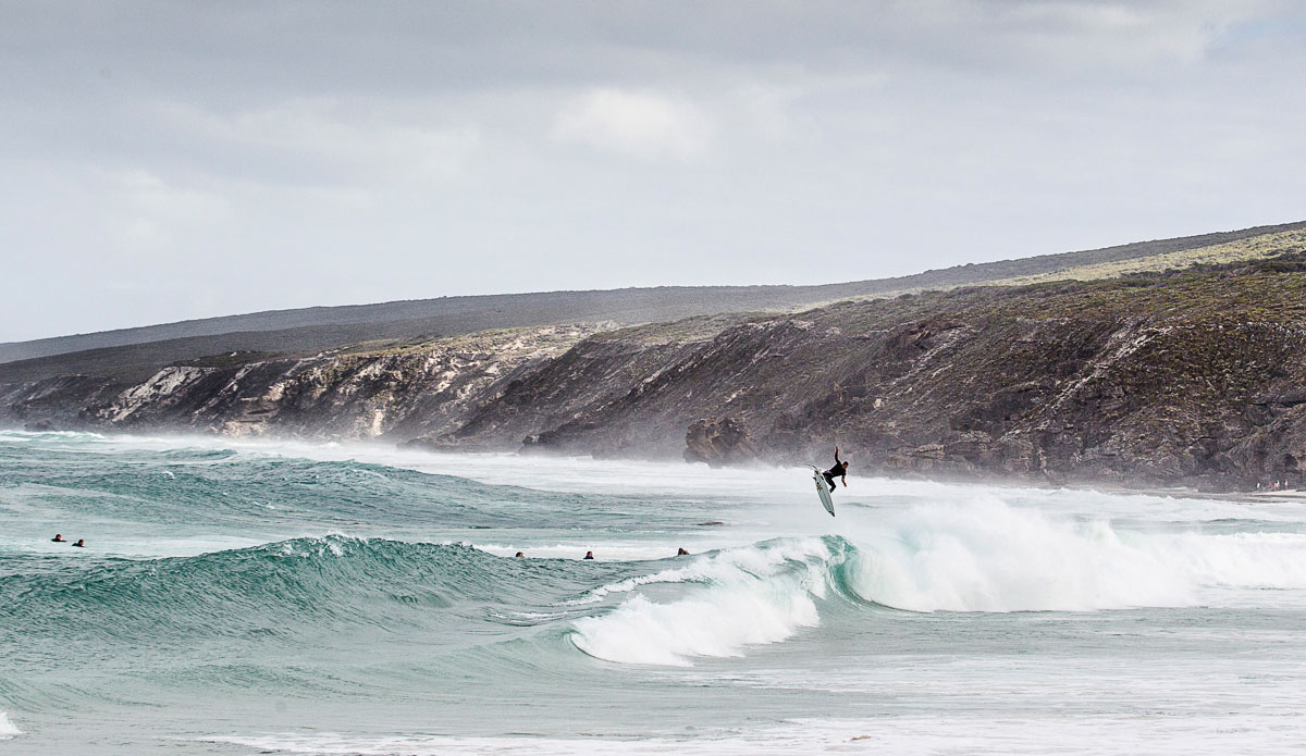 Australia\'s South West. Big landscapes, big swells and big local lads doing big airs. Jay Davies ticking all the boxes here. Photo: <a href=\"https://johnbarton.net.au/\">John Barton</a>