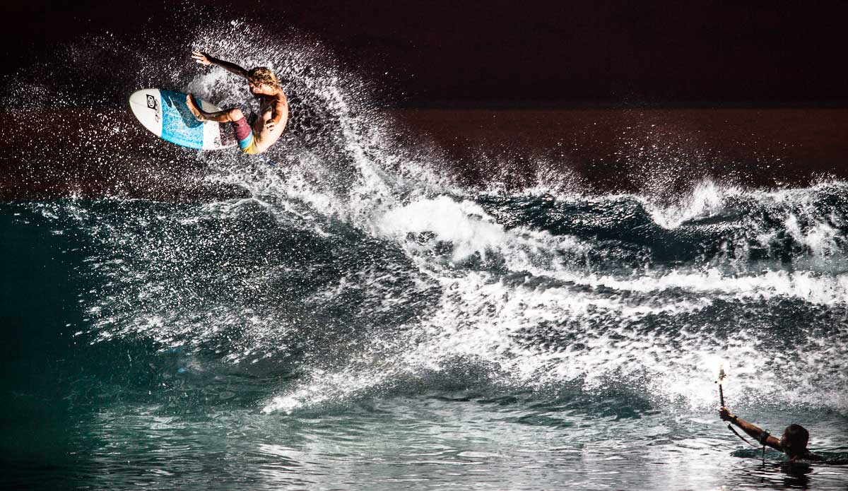 Matthew Burke lighting up the night. Photo: <a href=\"https://johnbarton.net.au/\">John Barton</a>