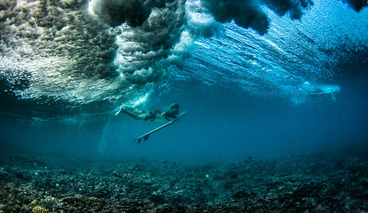Clouds and coral. Photo: <a href=\"https://johnbarton.net.au/\">John Barton</a>