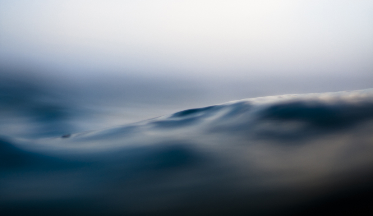 A small swell approaches on a moody evening. Photo: <a href=\"https://www.LucarelliPhoto.com/\"> John Lucarelli</a>
