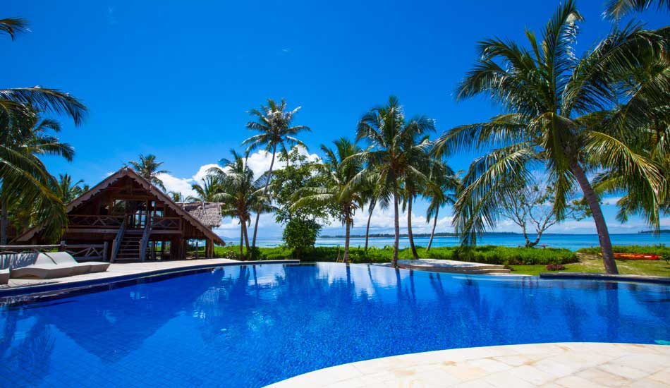 If you\'d rather chill by the pool rather than in the sand, that is an option too. Photo: <a href=\"https://www.hungrywalrus.com/\" target=_blank>John Maher</a>