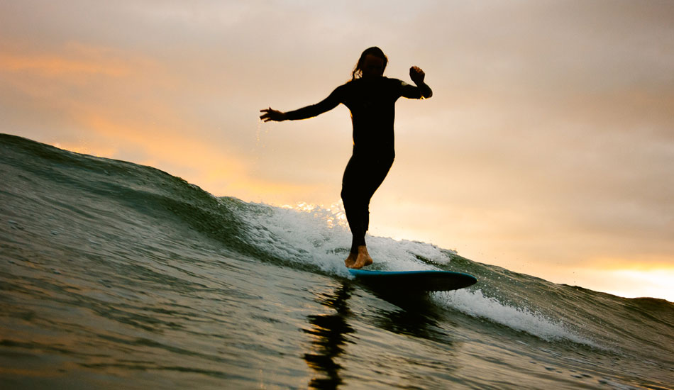  Cross stepping to the nose, Jamie Coxon gets an evening surf in as a storm begins to build overhead.  Photo: <a href= \"https://molyneuxphoto.com/\">Jean Paul Molyneux</a>