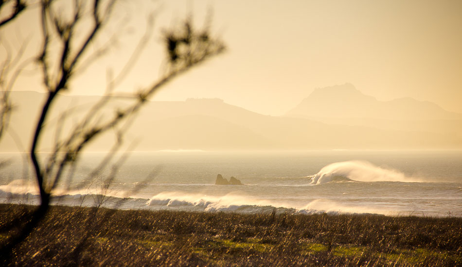 A sunrise freight train rolls through the a lonely Central California coastline. Photo: <a href= \"https://molyneuxphoto.com/\">Jean Paul Molyneux</a> 