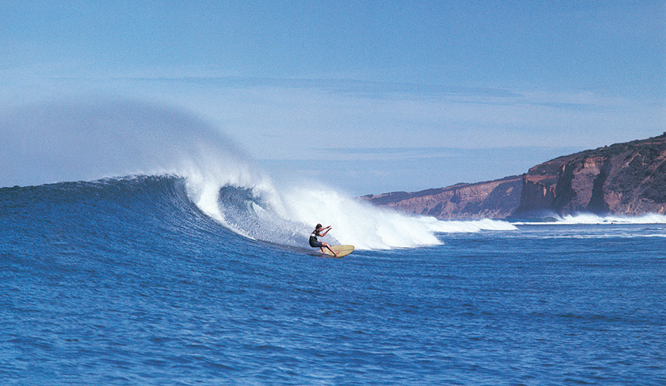 A picture of the Bells contest in 1969 taken from Flossie Neylan’s boat. What I now appreciate about the fact that in those days we didn’t have 10,000 mm lenses (I exaggerate slightly), is that the ocean (and the landscape in this instance) played such a significant part in the picture. We couldn’t get super close with the telephoto lenses we had. The wave itself was always a major player. I admire enormously the remarkable water photography that’s coming out of surfing these days, but the aerials (mostly without wave in sight) leave me cold. Did they make the wave? No one cares? Okay.