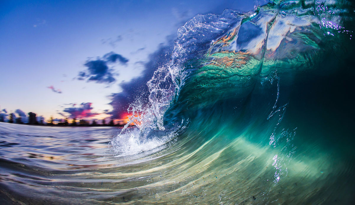 Flash assisted shorebreak.  Photo: <a href=\"https://www.jonwrightphoto.com\">JonWrightPhoto.com</a>