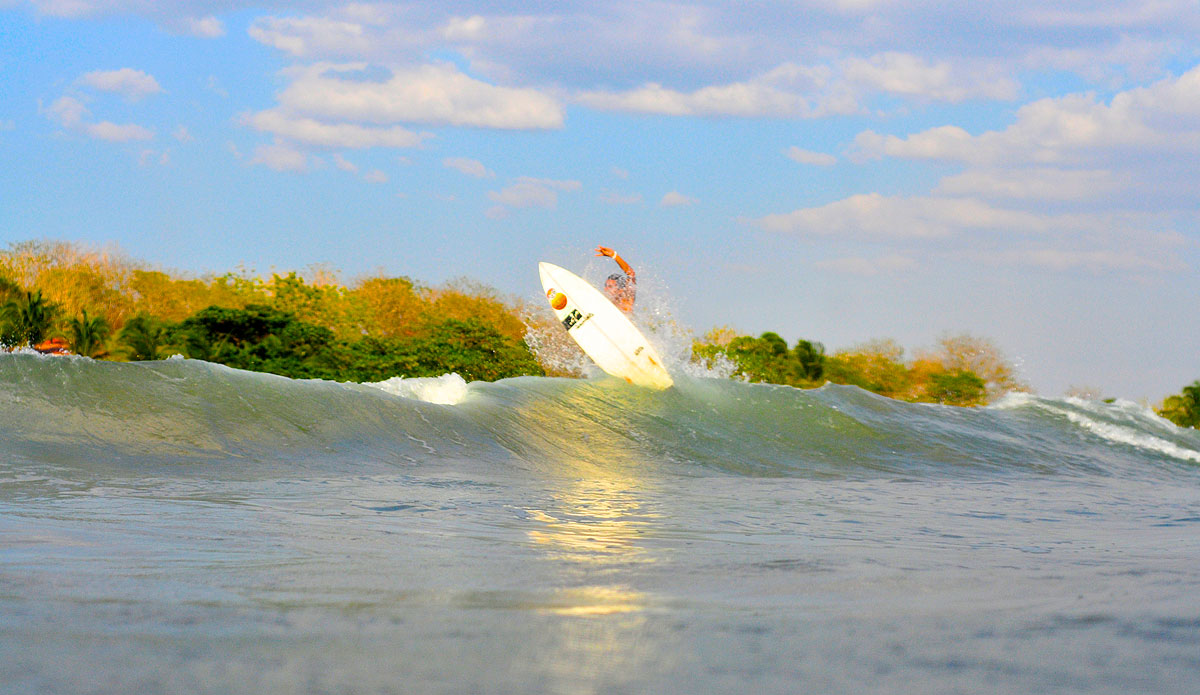 David, our surf guide, about to get an aerial view over the jungle. Photo: <a href=\"https://jonathanwatsonphotography.com/#/page/home/\">Jonathan Watson</a>
