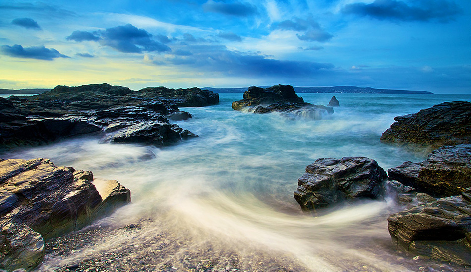 Taken at a small beach cove in Cornwall. This photograph was captured shortly after sunrise, as the tide was on the push. Photo: <a href=\"https://www.jordanweeks.com/\" target=_blank>Jordan Weeks</a>
