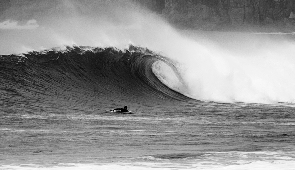 This has to be one of my favourite black and whites. For me it illustrates the loneliness of being out there in the sea by yourself, but at the same time, you know that this surfer is excited and ready to ride! Photo: <a href=\"https://www.jordanweeks.com/\" target=_blank>Jordan Weeks</a>