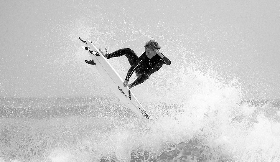 British surfer, Jayce Robinson, grabs the rail at his local beach break in Cornwall. Photo: <a href=\"https://www.jordanweeks.com/\" target=_blank>Jordan Weeks</a>