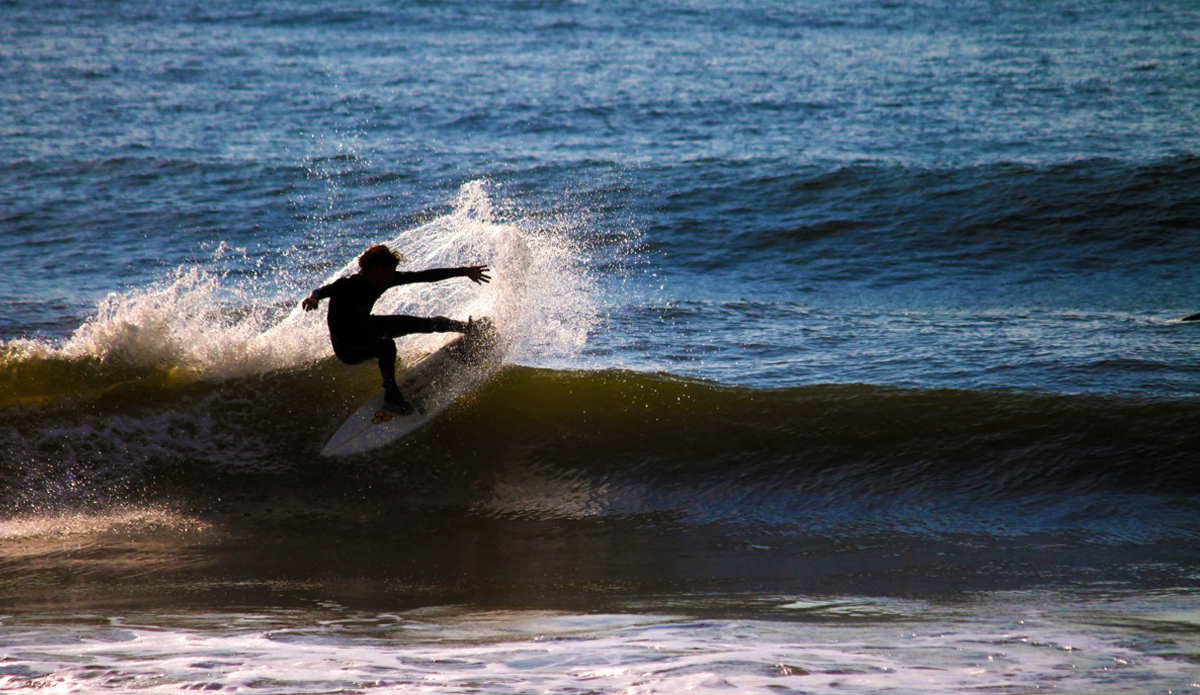 Who says you can\'t have fun on a surfboard in South Carolina. Photo: <a href=\"https://www.studiopierce.com/about/\">Josh Pierce</a>