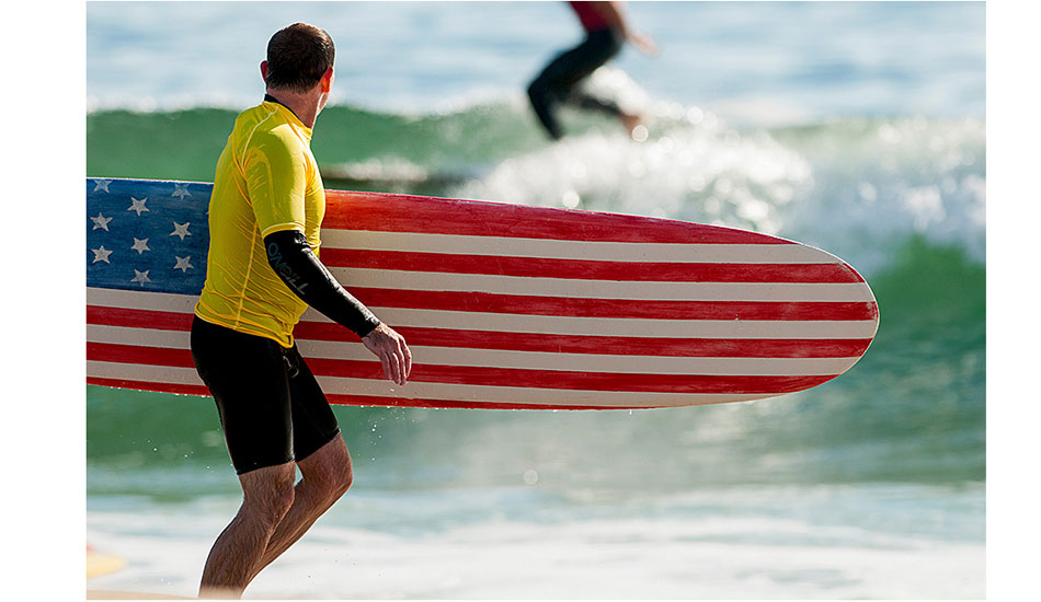 Manasquan, New Jersey. Matt Lewis with the flag board that was lost to Hurricane Sandy just six weeks later. Photo: <a href=\"https://joanneosh.zenfolio.com/\" target=\"_blank\">Joanne O\'Shaughnessy</a>
