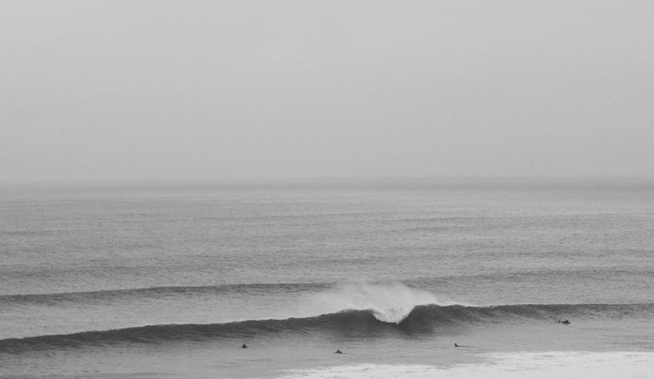 Watergate Bay throwing up a winter a-frame. Photo: <a href=\"https://www.mackie-studio.com\">Karl Mackie</a>