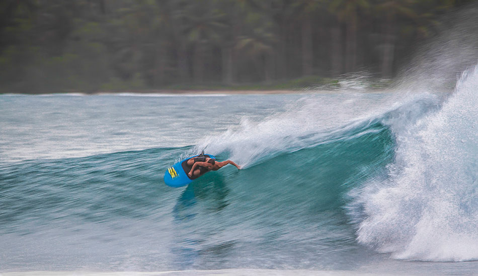 Chayne Simpson speed lines down the famous Nias wall. The low center of gravity gives a great sense of speed. Photo: <a href=\"https://www.16images.com.au\">Steen Barnes</a>