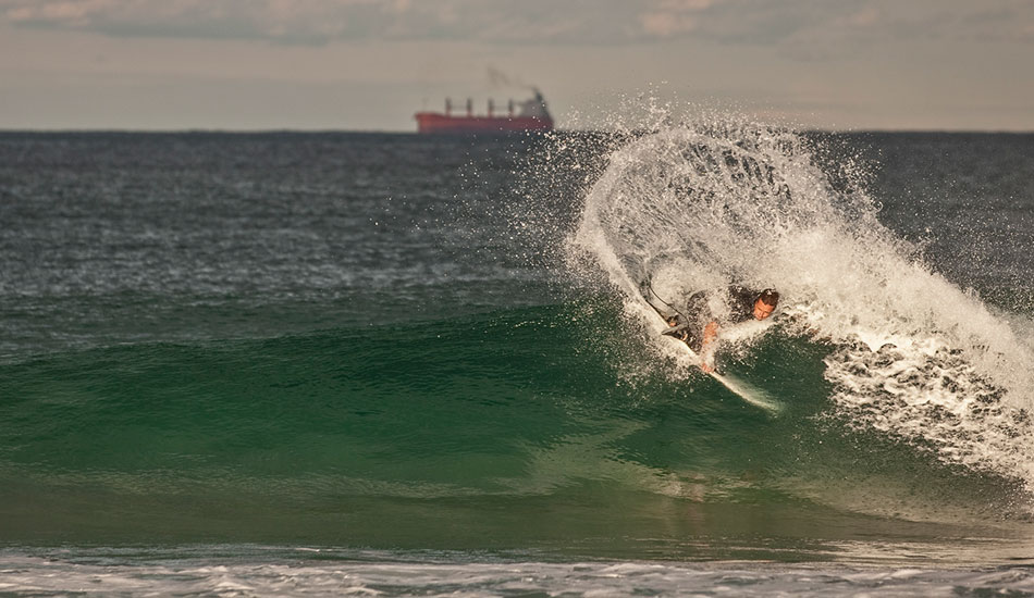 Kneeboarding and small wave surfing has come along way in the last 15 years, new board designs have made it fast, exciting to watch and a lot of fun, Chayne Simpson hacking. Photo: <a href=\"https://www.16images.com.au\">Steen Barnes</a>