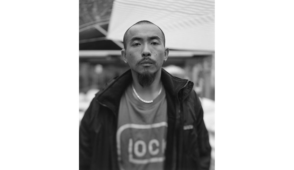 Local surfer, Lau Wing. Photo: <a href=\"https://www.stephenarthurmilner.com\">Stephen Milner</a>