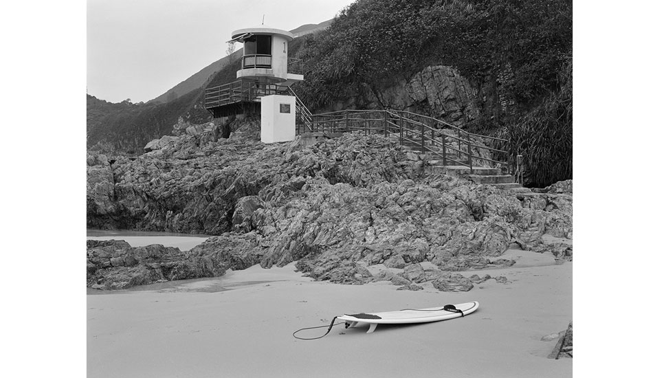 Big Wave Bay is surrounded by lifeguard stands and shark nets. Photo: <a href=\"https://www.stephenarthurmilner.com\">Stephen Milner</a>