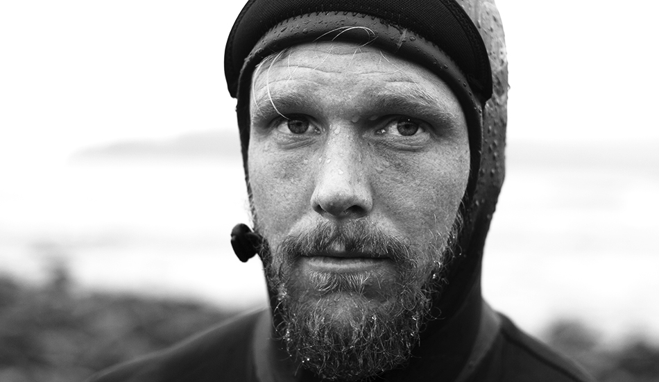 This is a portrait of Reid Jackson on the west coast of Hiada Gwaii. We were dropped off on a very secluded area for a 10 day trip in search of waves and fortune wild. We found three waves within ten minutes of camp. As you can see here, Reid was very excited about his last surf. Photo: <a href=\"https://www.kylervos.com/index2.php#!/Home\">Kyler Vos</a>