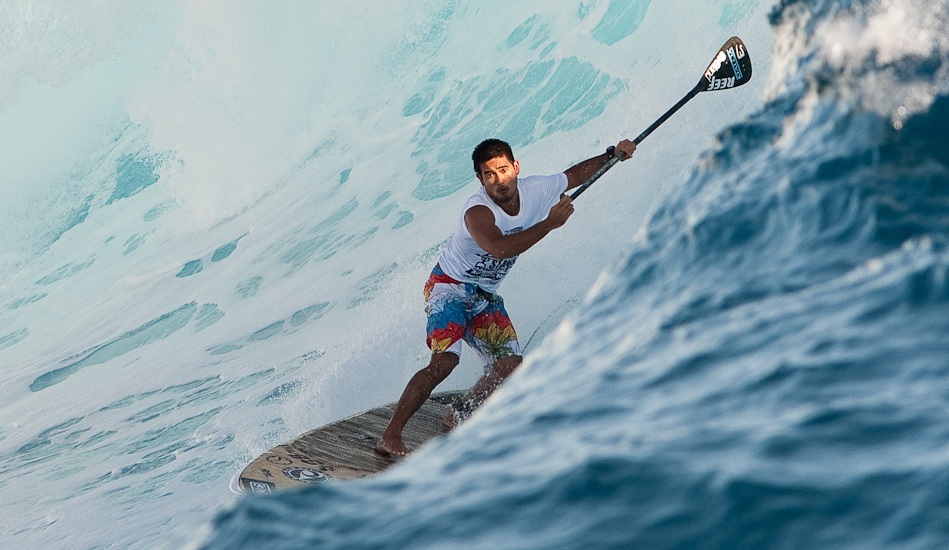 I was invited to check out the SUP World Championships on Tahiti. I was never really sure if I liked SUP, ‘cause back home in Germany, too many people use it as a modern version of Nordic walking. But checking out Garrett McNamara and all these big wave legends ripping these huge boards in triple overhead barrels at Sapinus was more than a little impressive. Photo: <a href=\"https://www.larsjacobsen.com/\" target=_blank>Lars Jacobsen</a>.