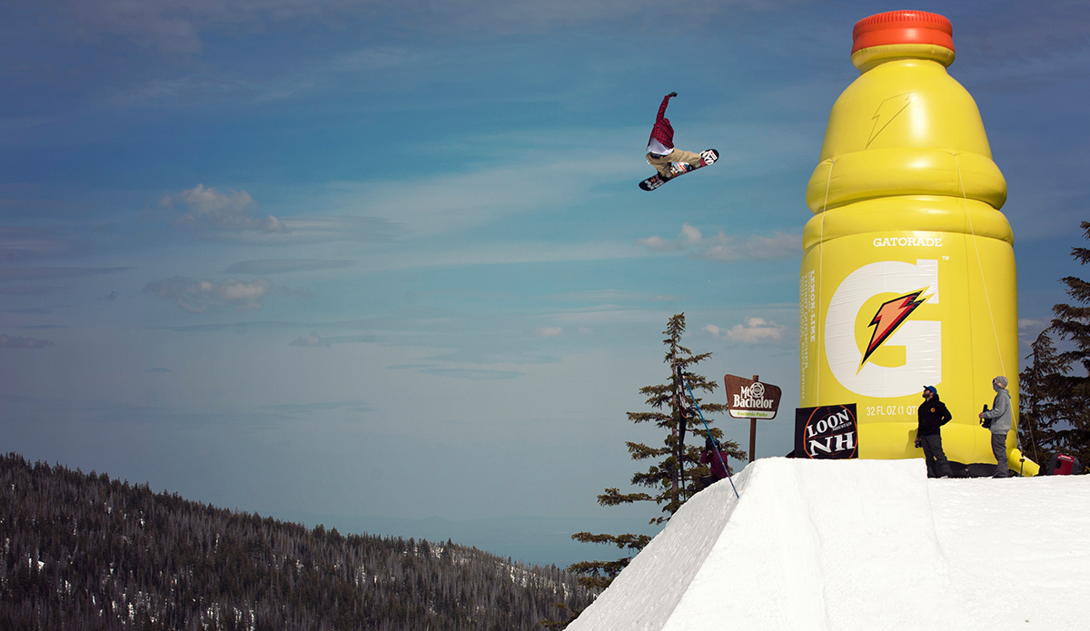 Pat Moore going balls to the wall of a hip at Superpark in Mt. Bachelor, Oregon. Photo: <a href=\"https://lauraaustin.4ormat.com/\">Laura Austin</a>