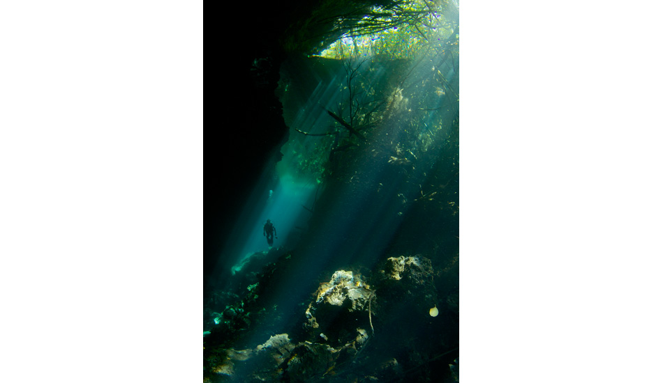 Local activist Nancy DeRosa at her namesake cenote Ponderosa. Photo: <a href=\"https://liabarrettphotography.com/\" target=_blank>Lia Barrett</a>