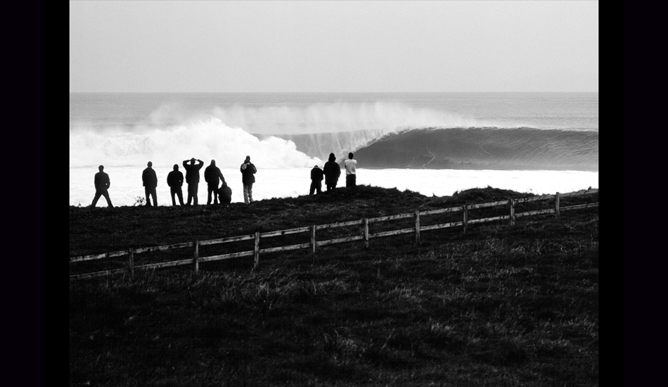 October 2002 - On the last day of my first trip to Ireland, and after nearly two weeks of sunshine and playful surf conditions, the real deal arrived in the form of a macking NW swell and typically gloomy skies. This reef at the south end of Bundoran was firing on all cylinders There were more people watching than taking off on waves, and those that were having a go weren\'t fairing terribly well on these triple up widow-maker peaks. Image: <a href=\"https://stevefitzpatrick.com/\" target=\"_blank\">Fitzpatrick</a>  