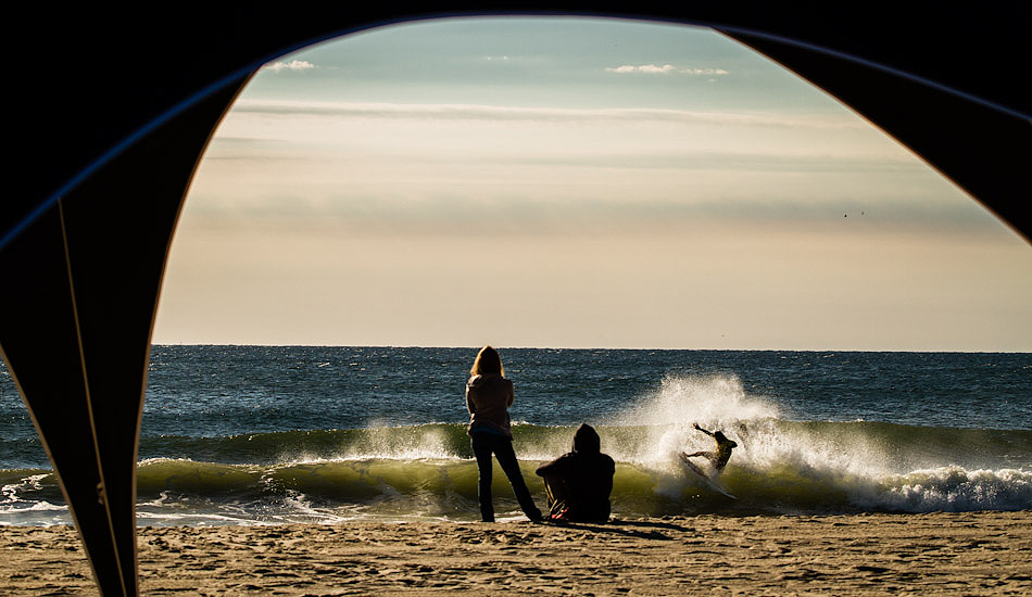 A surfer snaps a turn during warmups before the 2012 Belmar Pro. Photo: <a href=\"https://christor.photoshelter.com/\" target=_blank>Christor Lukasiewicz</a>