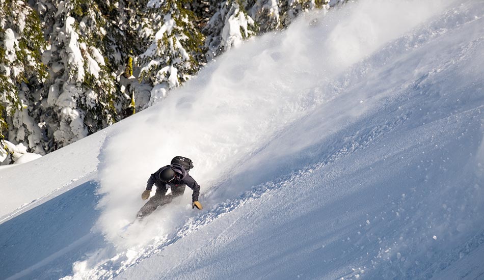 North facing slopes provided plenty of the light and dry this year. Eric Wallis, partaking. Photo: Colin Wiseman, The Snowboarder\'s Journal