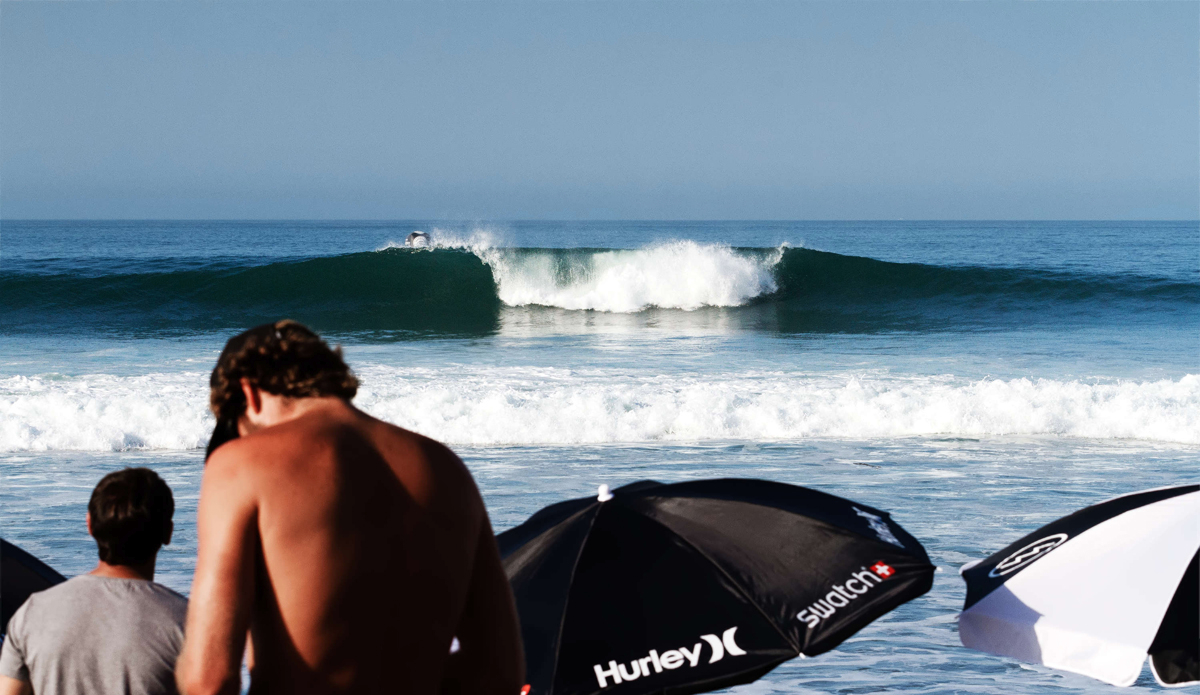 An empty peak rolls through while the lineup is cleared for the beginning of the Hurley Pro. Photo: <a href=\"https://www.rookemedia.com\">Tyler Rooke</a>
