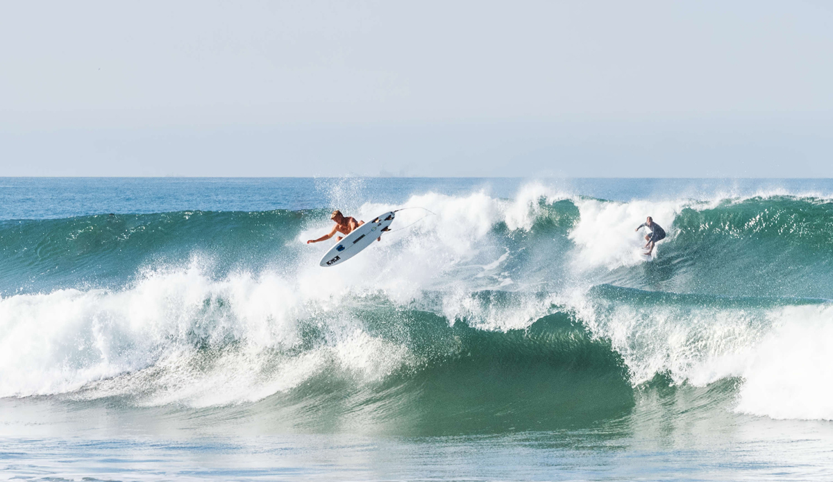 One of many groms psyched to show off for the pros in town. Photo: <a href=\"https://www.rookemedia.com\">Tyler Rooke</a>