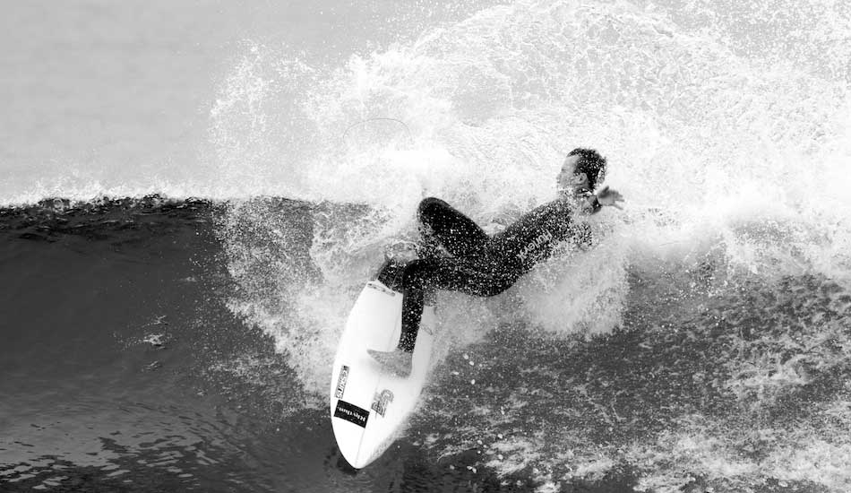 Kieren Perrow lays one back on a foggy, fun-sized morning during the first heat of the 2013 Hurley Pro at Lower Trestles, San Clemente. Photo: <a href=\"https://www.driftwoodfoto.com/\">Benjamin Ginsberg</a>