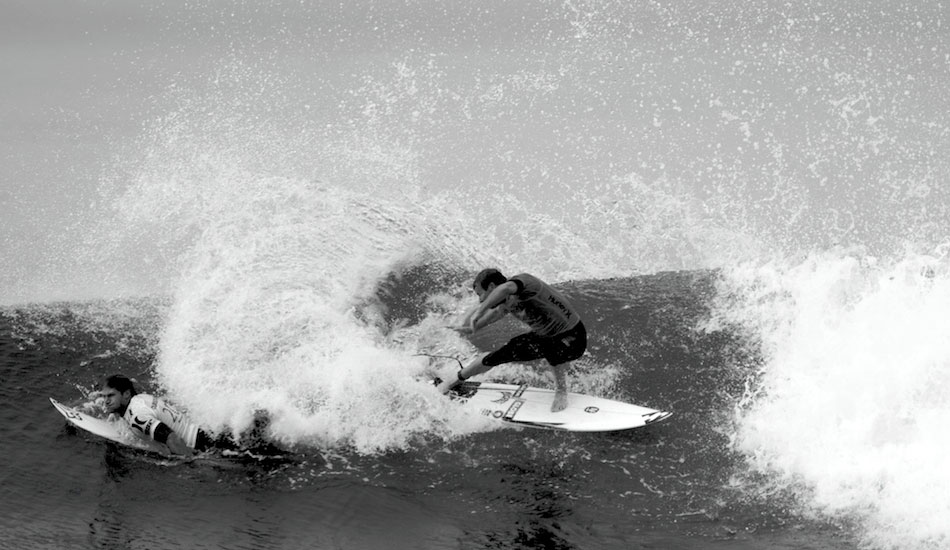 Bede Durbidge takes an early shower courtesy of Taj Burrow. Photo: <a href=\"https://www.driftwoodfoto.com/\">Benjamin Ginsberg</a>