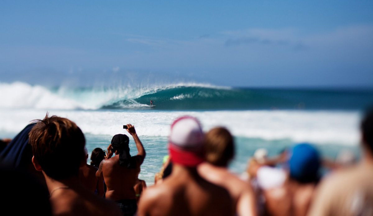 Pipeline, Hawaii. Taken during the Pipeline Masters last year during Kelly\'s 10-point wave. I was shooting with my Lensbaby lenses which I love to throw in the mix. Action is hard to capture with them as the focus is very hard to get right on a moving subject, but I managed to get this frame. I am a pro shooter for Lensbaby lenses and was happy to show them the results of this pulled back image. Photo: <a href=\"https://www.luciagriggi.com\" target=\"_blank\">Lucia Griggi</a>