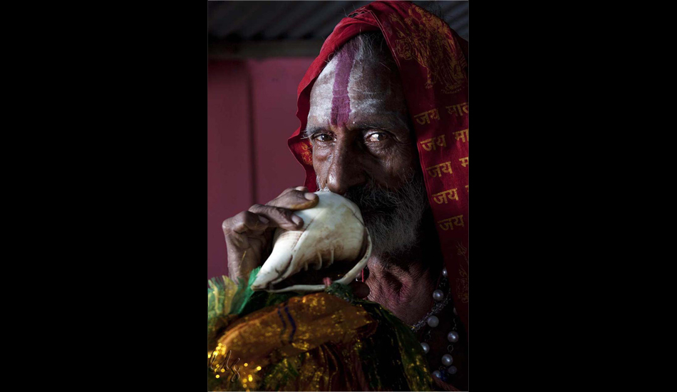THE CONCH SHELL. 
On the \"katragarma walk\", a pilgrimage from the northern territory of Sri Lanka through Yala National Park to the southern tip, barefoot pilgrims walk year in and year out. This portrait was taken for a Surf Europe feature. Photo: <a href=\"https://www.luciagriggi.com\" target=\"_blank\">Lucia Griggi</a>