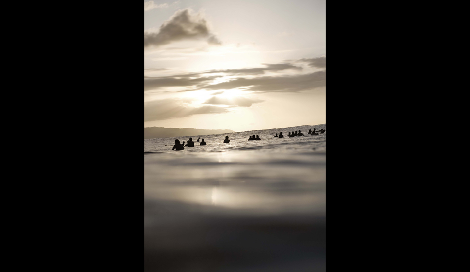 PIPELINE.
The line-up at dusk, as a small set rolls beneath. Photo: <a href=\"https://www.luciagriggi.com\" target=\"_blank\">Lucia Griggi</a>