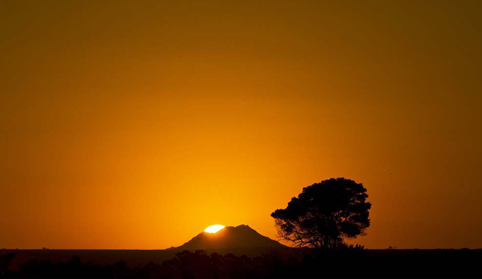 AFRICAN SUNSET, on the way back to Jeffreys from Shamwari National Park, 2008. Photo: <a href=\"https://www.luciagriggi.com\" target=\"_blank\">Lucia Griggi</a>