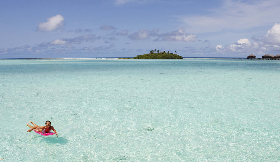 MALDIVES, DHONVELLI ISLAND. 
This photo was taken from a water hut on the east side of the island. We had explored many waves over the last few days on the island. This was a paddle back we made from one of the outer reefs.  Photo: <a href=\"https://www.luciagriggi.com\" target=\"_blank\">Lucia Griggi</a>