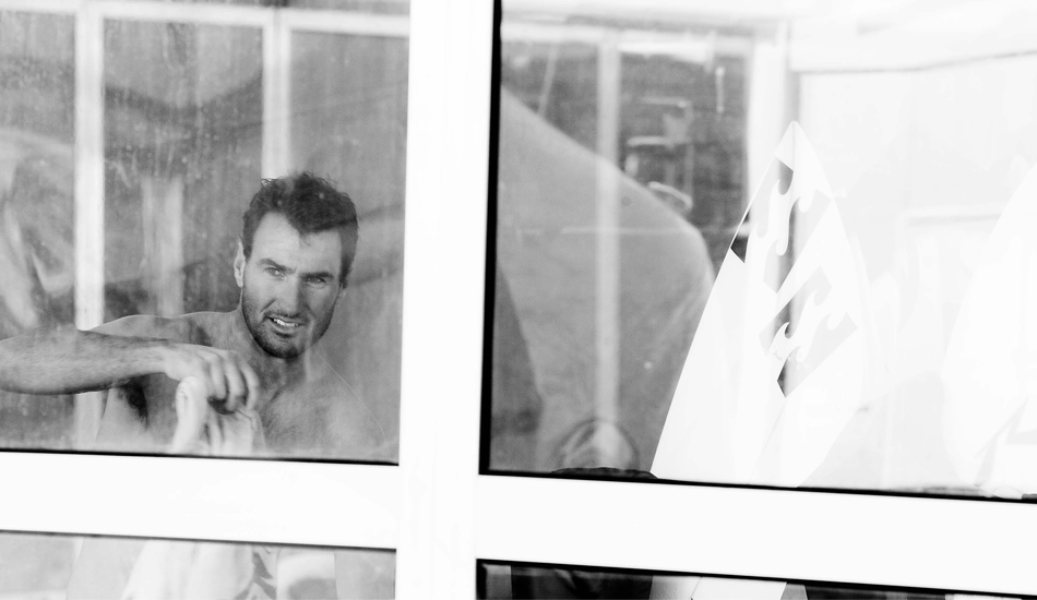 JOEL PARKINSON, Portugal 2010. 
Taken before Parko\'s heat at Supertubos, shot through the window of the surfers\' area. Photo: <a href=\"https://www.luciagriggi.com\" target=\"_blank\">Lucia Griggi</a>