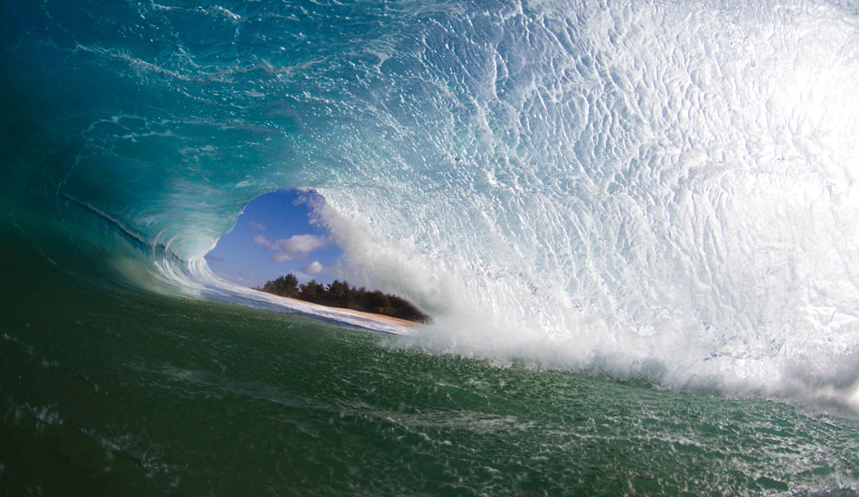 After sitting on the beach with my two buddies Shane Grace and Nick Maier and seeing this one rolling in, they yelled at me to get out there and I barely made it under this wave. Couldn\'t even fit the whole wave into my camera view. Photo: Luke Forgay