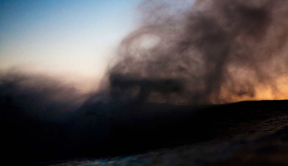 I\'d been to Hawaii three seasons to surf and shoot the odd photo but hadn\'t actually dedicated the majority of a season behind the lens. This was my first trip over there shooting. The first day, in fact. It was a new swell at Pipe and pretty backwashy and doubling up, but I was just loving being in the water so I stayed out shooting until it was near black. This was well after the sun had set, with the afterglow still lingering on the horizon. I had to slow the shutter down to get any semblance of a decent exposure and the spit from this wave made some interesting shapes against the blues and oranges behind it. Photo: <a href=\"https://www.lukeshadbolt.com/\">Luke Shadbolt</a>