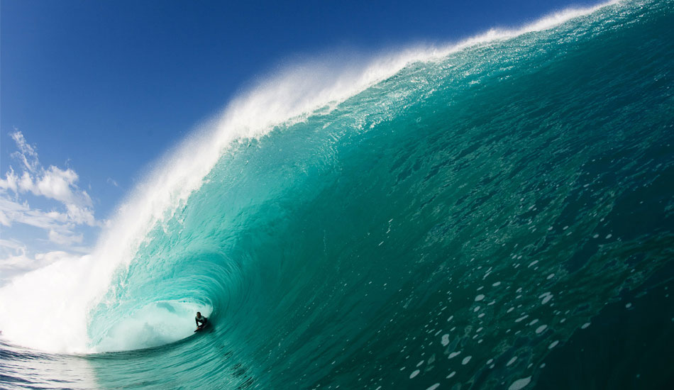 Matt Young in one of the biggest barrels I\'ve ever pointed my camera at. It looks like Pipe, but it is not. I\'ve already said too much. Photo: <a href=\"https://www.lukeshadbolt.com/\">Luke Shadbolt</a>