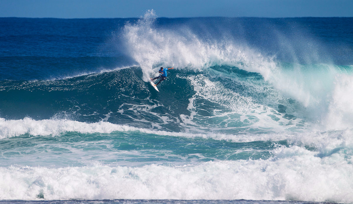 Michel Bourez powers through a massive hack Photo: <a href=\"https://www.worldsurfleague.com/\">WSL</a>/Kirstin