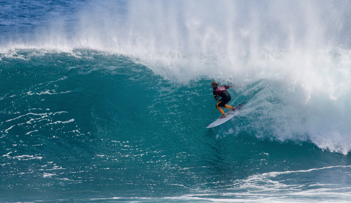 Josh Kerr finding a pretty great hiding spot. Photo: <a href=\"https://www.aspworldtour.com/\">ASP/Cestari</a>