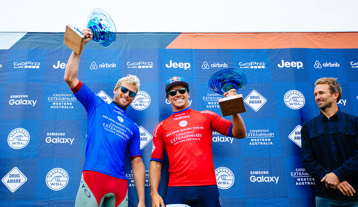 Winner Sebastian Zietz of Hawaii (pictured blue) and runner up Julian Wilson of Australia (red) hold their trophies during prizegiving at the Drug Aware Margaret River Pro in Western Australia on Saturday April 16, 2016. Photo: <a href=\"https://www.worldsurfleague.com/\">WSL</a>/<a href=\"https://www.instagram.com/edsloanephoto/\">Ed Sloane</a>