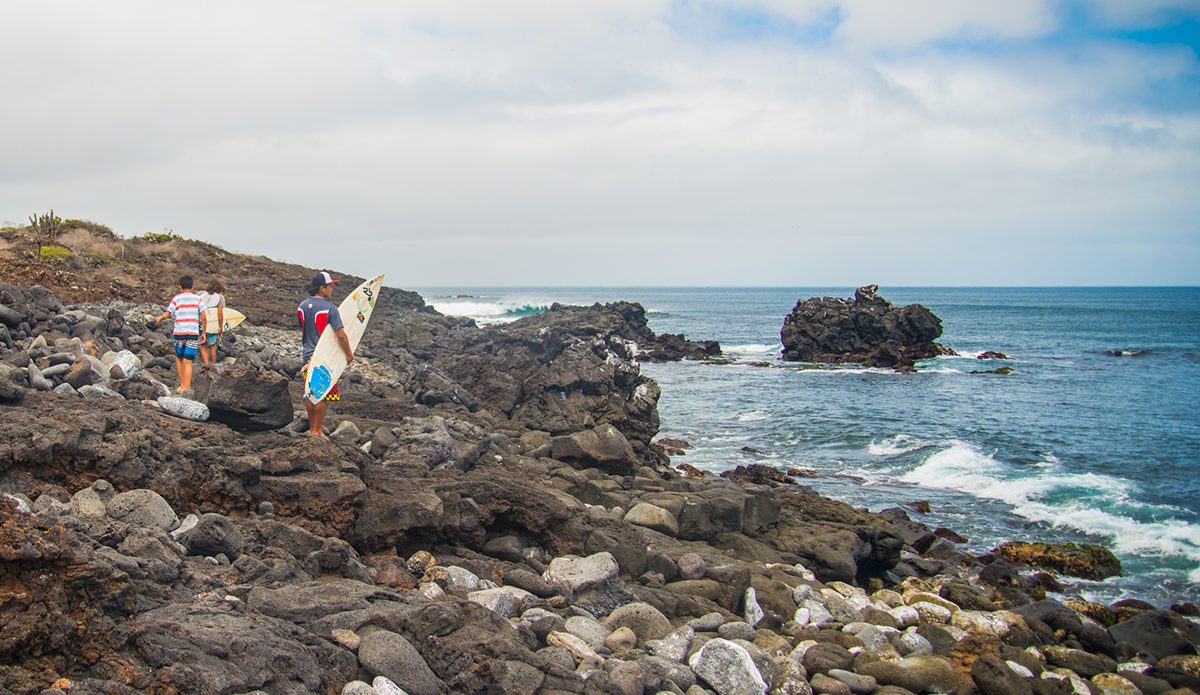 Andres and Wilson, Floreana locals, hiking their way to the surf. Photo: Maria Fernanda 