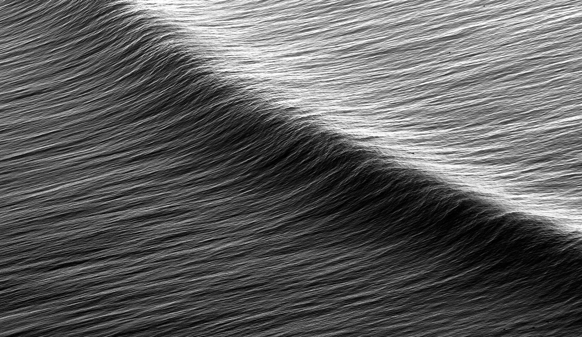 I’ve always loved how this image reminds me that waves travel so far before they hit a shallow coastline and stand up and break so that we can ride them. Photo: <a href=\"https://markmcinnis.com\">Mark McInnis Photography</a>