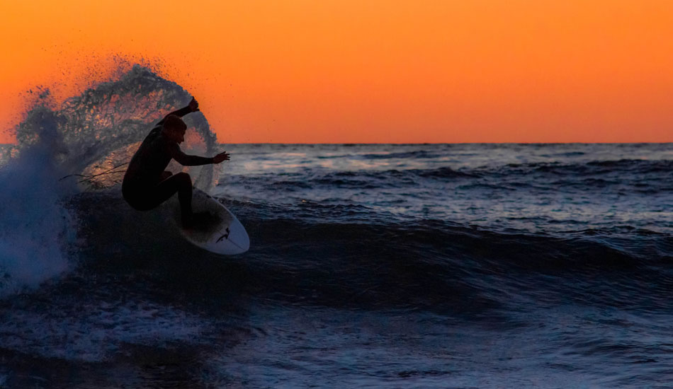 Unknown surfer throwing buckets in La Jolla. Photo: <a href=\"https://www.mattadenphotography.com\">Matt Aden</a>