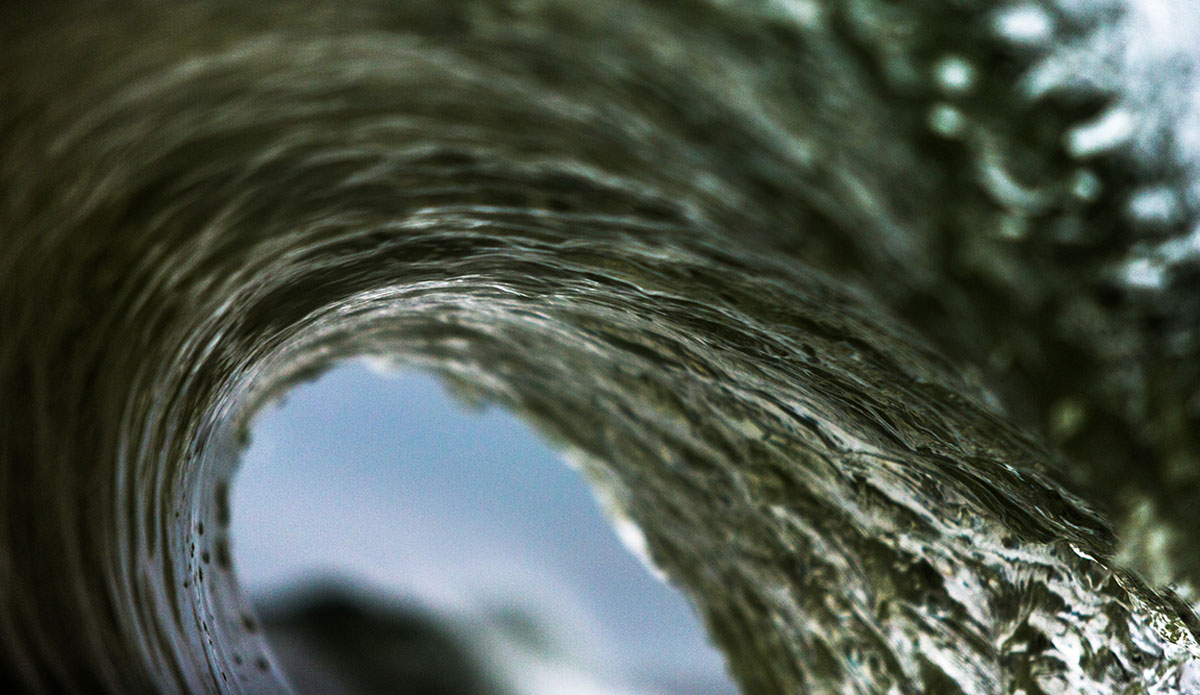 Caved- Mid-winter New York. This was January of 2014 on a smaller but perfectly clean day, it takes a lot of dedication to suit up and not surf, but to shoot photos instead. None of my photos are shot with the intention of having them published because I just don\'t find that there\'s a market for them. Instead it\'s been my intention of capturing waves shapes and textures over the past year or so. I\'ve seen a lot of other people going down this path and I think it\'s starting to click that in lots of photographers minds that there\'s just as much demand to see the work you\'re passionate about vs. the images of great feats (for example, an incredibly artistic well lit dramatic empty wave vs. someone getting shacked out of their mind at 30 foot Chopes.\" Photo: <a href=\"https://www.clarkography.com/\" target=_blank>Matt Clark</a>